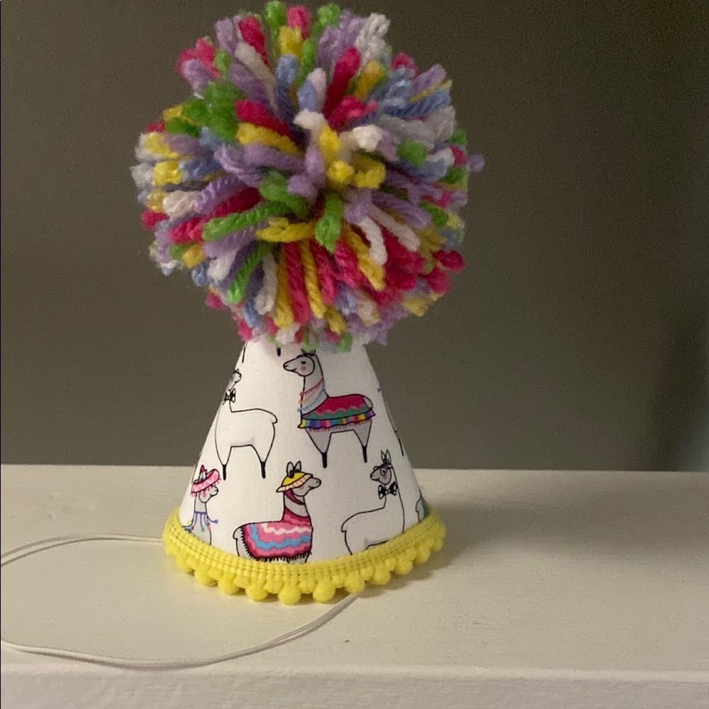 White Party Hat with Colorful Polka Dots and Fluffy Pom-Pom